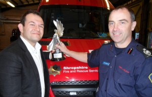 SFS Award Deputy Chief Fire Officer John Redmond and Beacon Radio copywriter Simon English with the award at the Shrewsbury fire HQ.