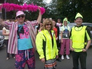 Staff pictured with front, left to right, call handler Ben Doyle, TTC Group Managing Director Jenny Wynn (wearing a flashing light outfit) and General Manager Des Morrison (right front). Staff pictured with front, left to right, call handler Ben Doyle, TTC Group Managing Director Jenny Wynn (wearing a flashing light outfit) and General Manager Des Morrison (right front).