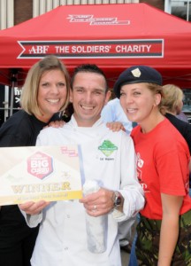 Giant Curry charity competition in The Square Shrewsbury on Saturday, winning chef Ed with rival supporters. Giant Curry charity competition in The Square Shrewsbury on Saturday, winning chef Ed with rival supporters.