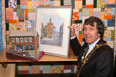 Mayor Cllr Keith Pinches with a number of the unique prizes Mayor Cllr Keith Pinches with a number of the unique prizes