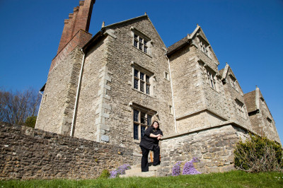YHA Wilderhope Manager Abbie Freeman sits outside the stunning Grade I listed Elizabethan Manor House. YHA Wilderhope Manager Abbie Freeman sits outside the stunning Grade I listed Elizabethan Manor House.