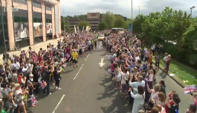 Thousands of people line the Telford Town Centre route. Photo: BBC. Thousands of people line the Telford Town Centre route. Photo: BBC.