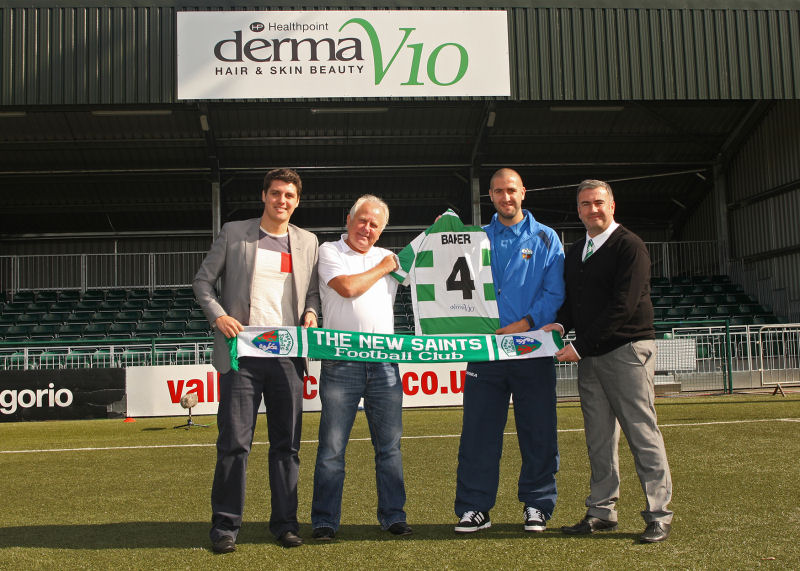 Healthpoint marketing executive Bruce Lansom and chairman Bob Seddon are welcomed by Saints defender Pip Baker and chief operating officer Ian Williams. Healthpoint marketing executive Bruce Lansom and chairman Bob Seddon are welcomed by Saints defender Pip Baker and chief operating officer Ian Williams.