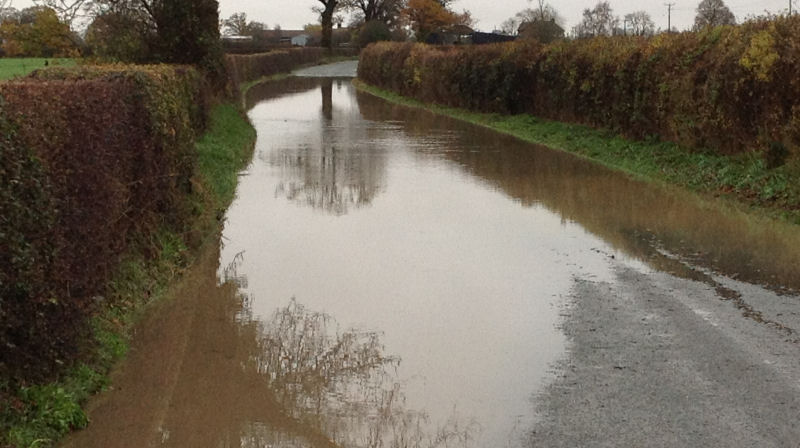 A flooded rural road near Shrewsbury. A flooded rural road near Shrewsbury.
