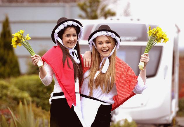 Aisling Kaura (left) and Grace Tolley don traditional Welsh costumes to promote St David’s Day at Salop Leisure in Shrewsbury.