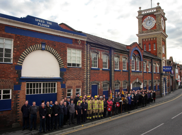 The 72 people line up outside Morris Lubricants in Castle Foregate, Shrewsbury to represent servicemen from the immediate area who died in World War One.