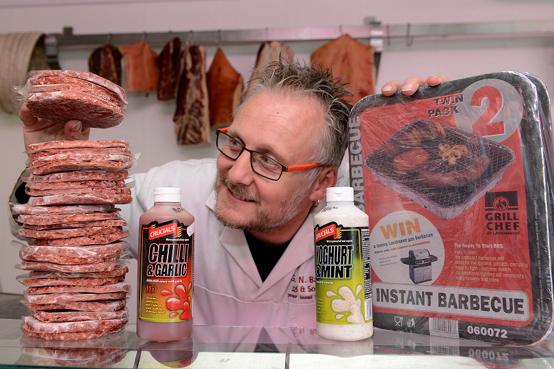 Lee Evans prepares BBQ products