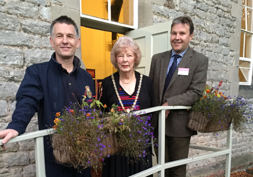 Robin Bennett of the Much Wenlock Community Responders with Mayor councillor Yvonne Holyoak and Paul Madeley, director of Madeleys Chartered Surveyors