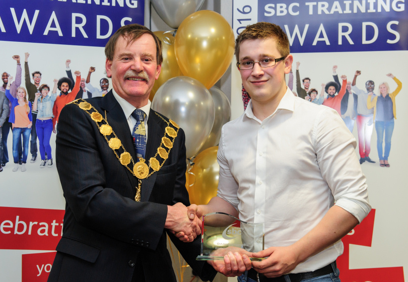 Jack Meredith, from Boxall and Edmiston, accepting his Oustanding Apprentice award for Engineering Technologies alongside Mayor of Shrewsbury Miles Kenny