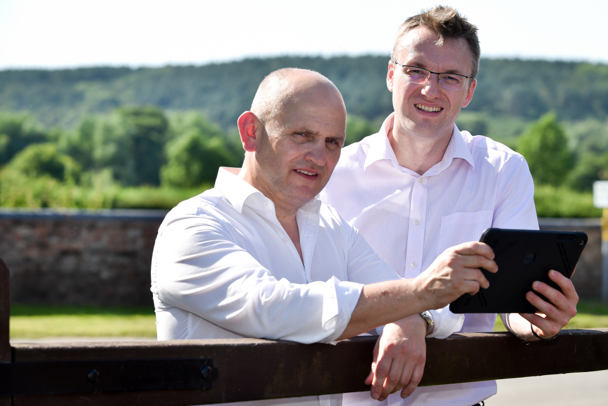 Crown Landscapes managing director, Gareth Emberton (left) discusses the tablet technology with Chris Pallett, Managing director of Bespoke Computing