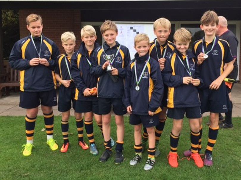 The team celebrating their success