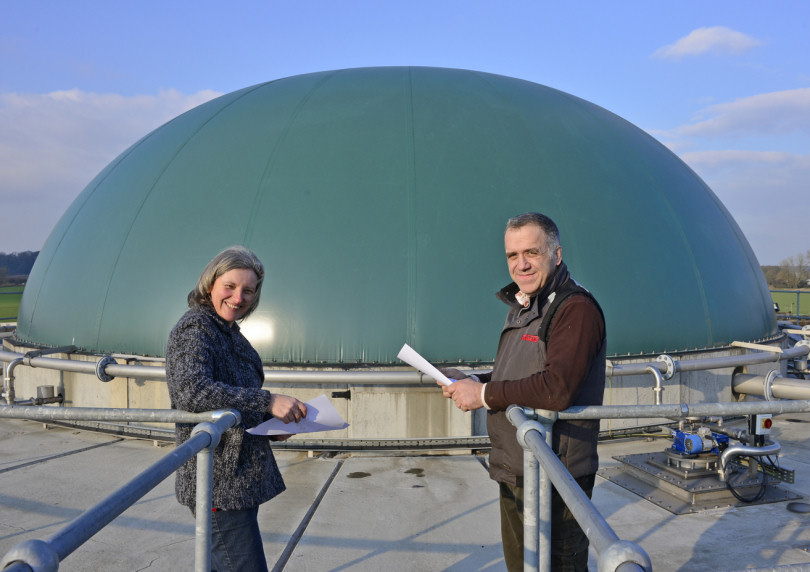 Pictured outside the farm’s anaerobic digester plant are Cath Edwards of Credibly Green and Neil Furniss