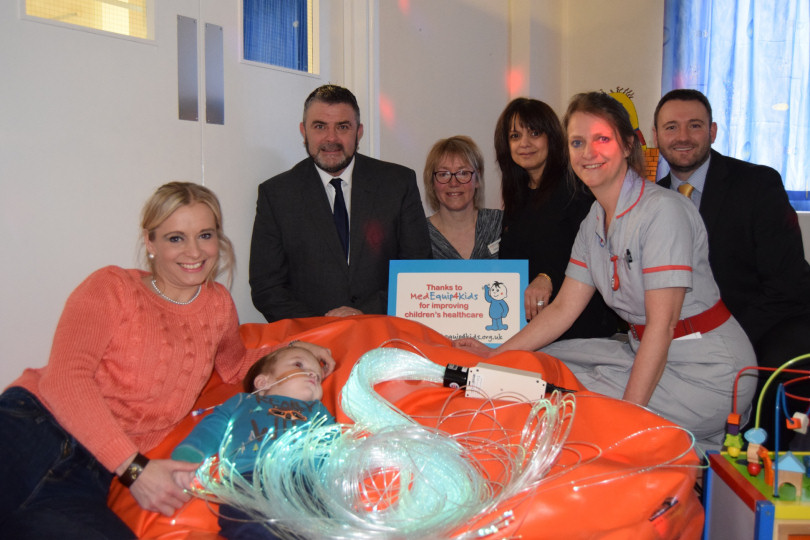 Pictured, from left: Lisa and Arthur Lake, Kier Construction Operations Manager Justin Williams, Medequip4kids Projects Coordinator Evelyn Glarvey, Medequip4kids Chief Executive Ghazala Baig, Alice Ward Manager Suzanne Marsden and Kier Construction Contracts Manager Dewy Edwards