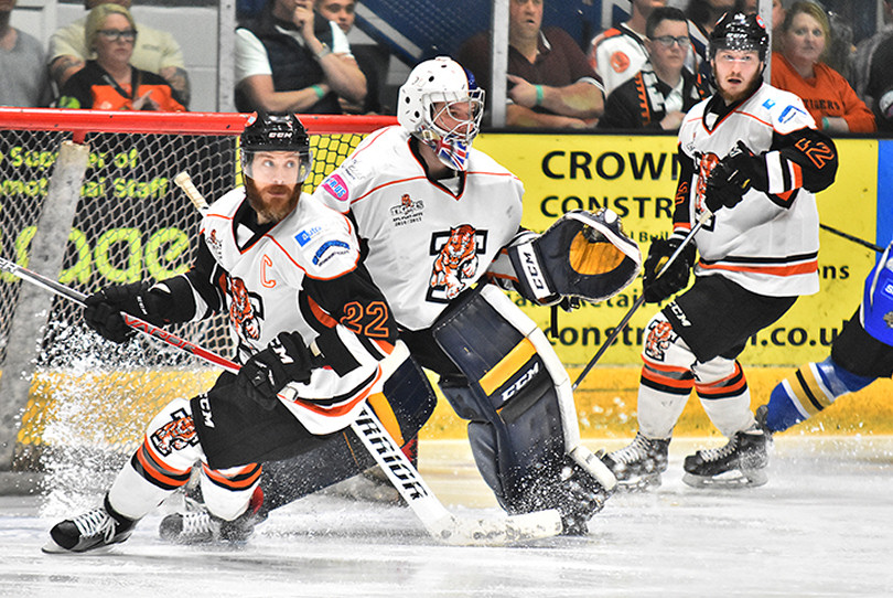 Tigers captain Jason Silverthorn (right), netminder Jon Baston and Danny Rose. Photo: Steve Brodie