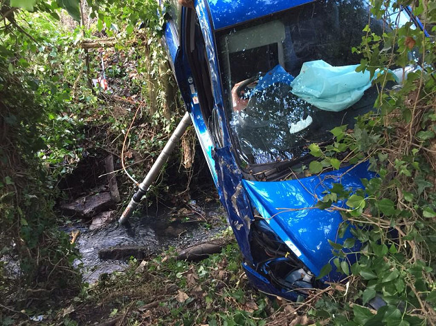 Elderly woman rescued from car suspended over brook