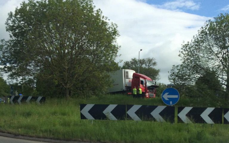 Lorry ends up in centre of A5 traffic island near Oswestry