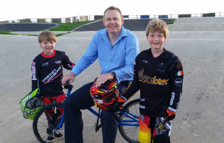 Wrekin Riders Kasperi and Markku Reynolds with Wayne Jenson, general manager of the Buckatree Hall Hotel as he hands over a new club bike