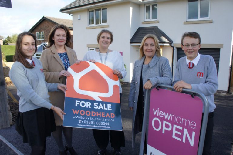 Eva Nikolova of The Marches School Eco Committee , Kate Howell owner of Woodhead Oswestry Sales and Lettings, Jo White Business Development Manager at The Marches School, Lorraine Hopkins Marketing & PR Manager at Tesni Homes, Niall Dennehy of The Marches School Eco Committee. All standing outside Tesni’s new view home on Morda Road