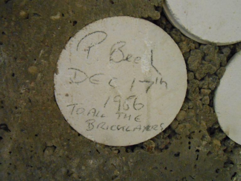 One of the stones says P Beech Dec 17th 1986 To All The Bricklayers
