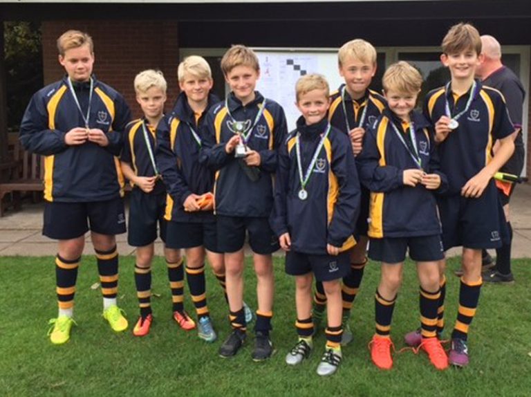 the team celebrating their success