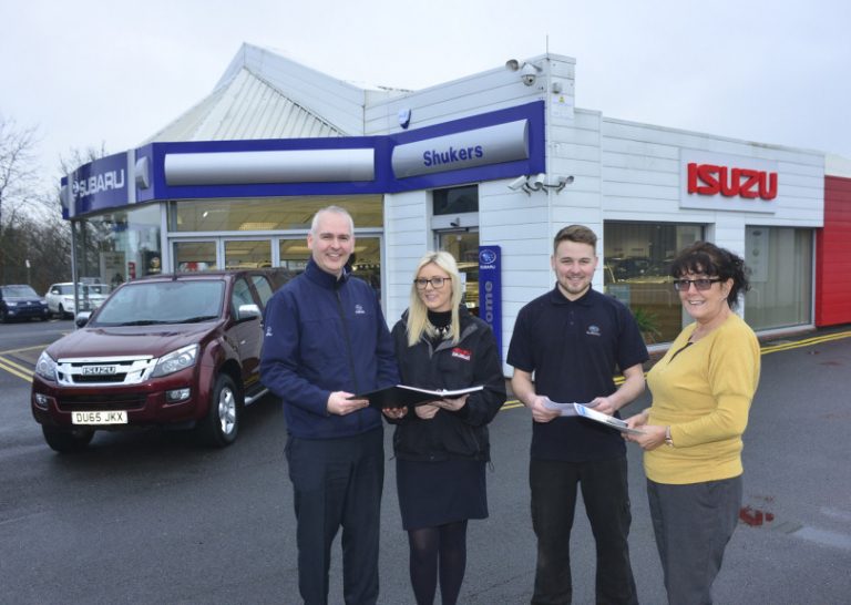 From left, Gary Bell (parts and service manager), Laura Canning (service reception), Will Heslop (vehicle technician) and Carrie Schmidt (sales administrator)