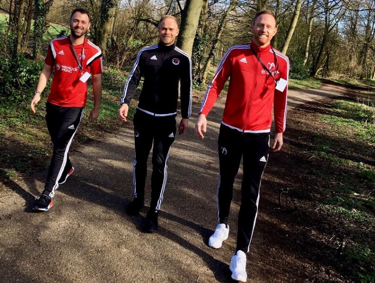 Ready to put their best foot forward for charity this weekend is Crossbar Coaching Education in Sport’s Jamie Haynes, left, and Gavin Cowan, with, centre, Andy Smith from the Crossbar Foundation