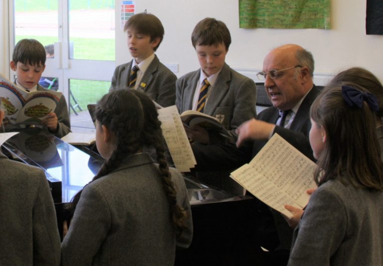 Jeremy Lund, director of music at Prestfelde School with pupils in a music lesson