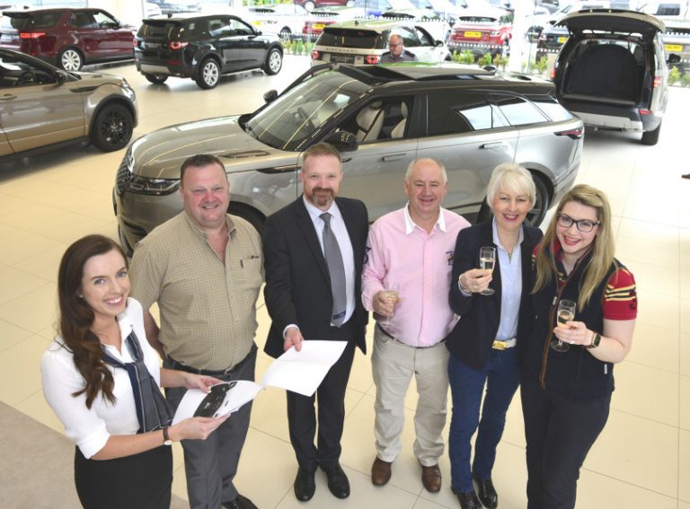 Shukers sales executive Jessica Jennings (left) with, from left, Amos Price, Matt Smout, Arthur Roberts, Caroline Roberts and Zara Roberts
