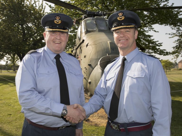 The outgoing Station Commander Group Capt Jason Appleton hands over command to Group Captain Chuck Norris (left