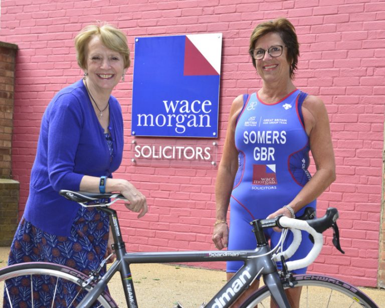 Barb Somers is pictured in her new sponsored tri suit with Diana Packwood, managing partner of Wace Morgan Solicitors