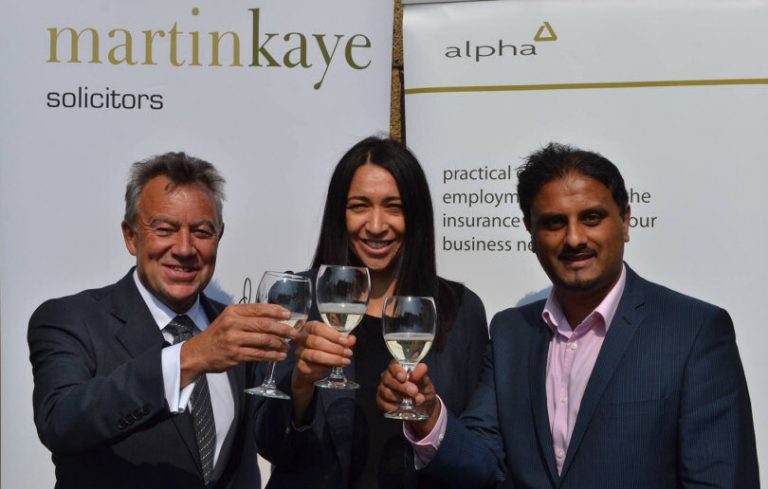 Graham Davies, Emma Palmer, and John Mehtam celebrate the 10th anniversary of the ALPHA scheme at Martin-Kaye Solicitors