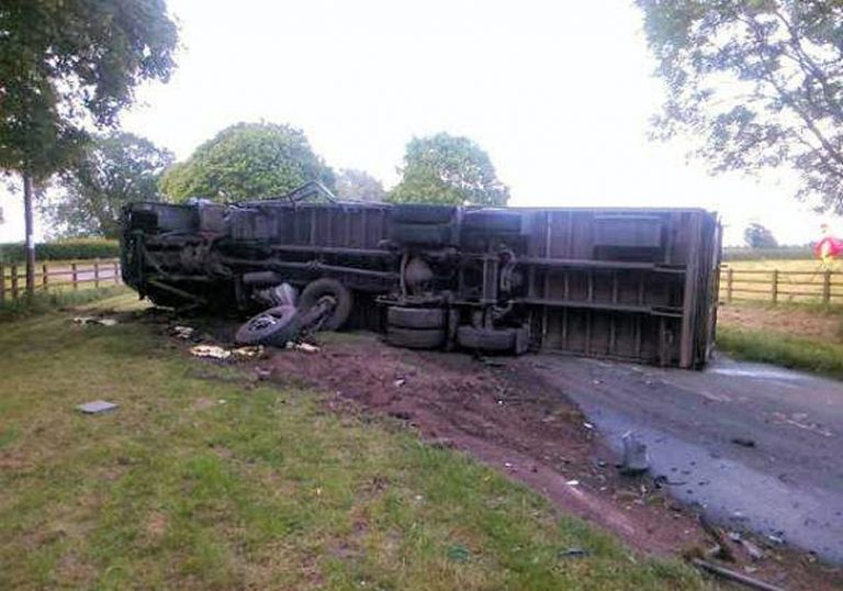 A lorry ended up on its side following the collision. Photo: West Midlands Ambulance Service