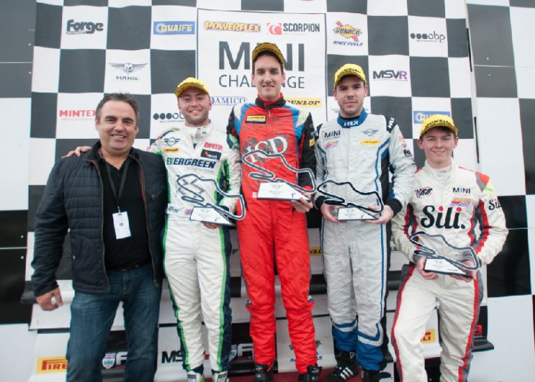 Rob Smith second from left on the podium at Donington Park Grand Prix Circuit. Photo: Mark Campbell/CarScene UK Media