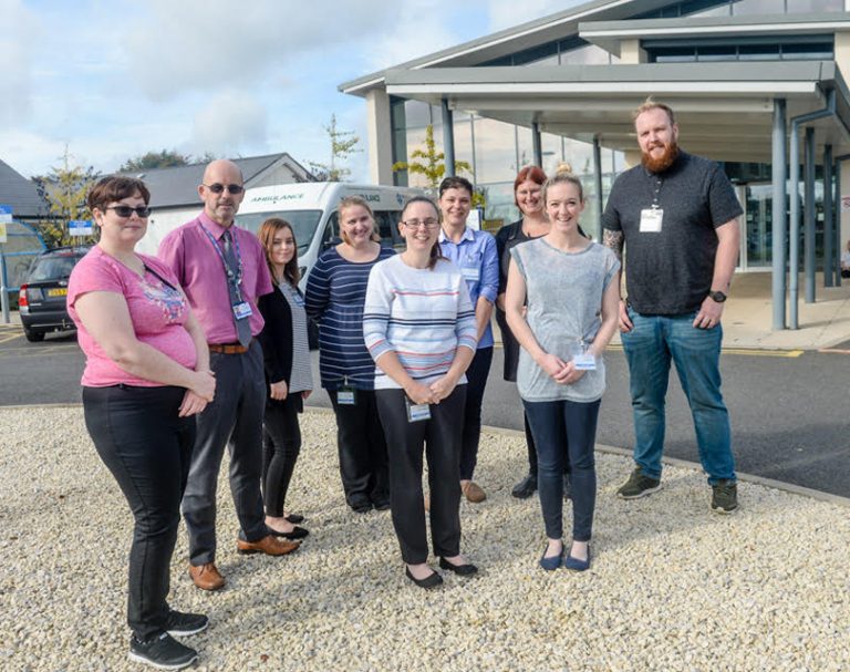 Lisa Sewell, Allen Edwards Apprentice Lead at RJAH NHS Foundation Trust, Emily Arnold, Nicola Smith, Sophie Harvey, Victoria Edwards, Iwan Roberts L/R Front: Tulisa Edwards, Zoe Nicholls outside the Orthopaedic Hospital