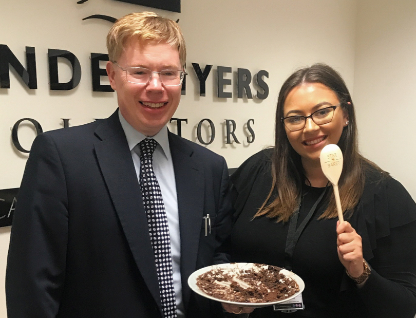 Richard Ashton presents Shannon Morgan with the Star Baker Wooden Spoon