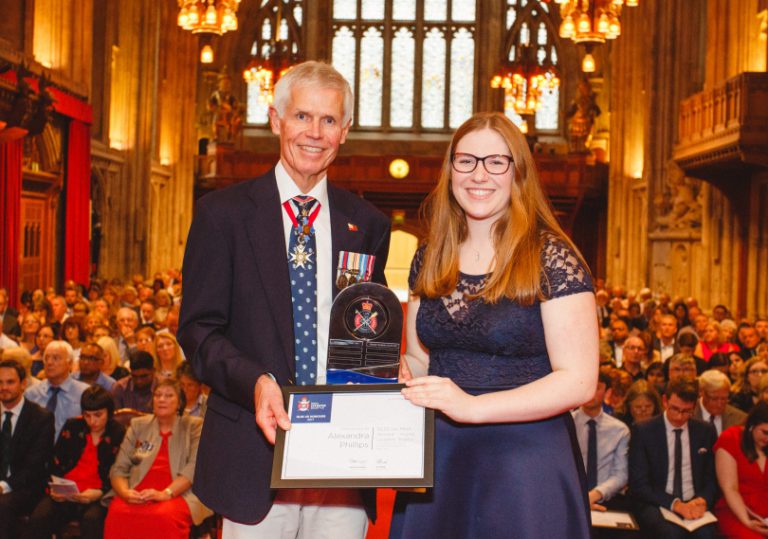 Alex Phillips, receiving a prestigious award for her incredible voluntary work
