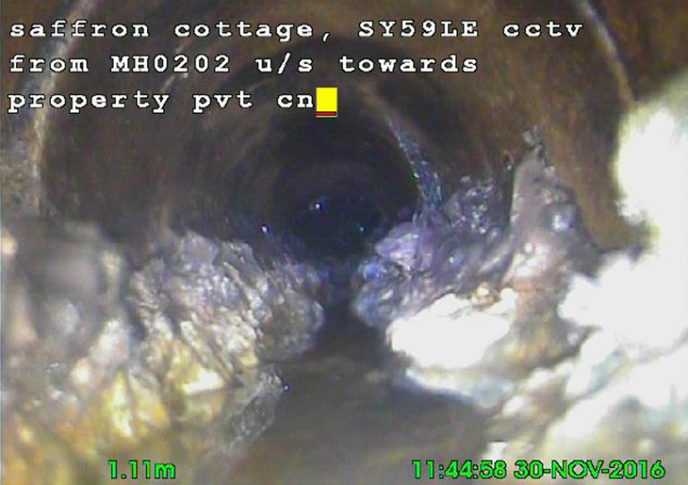 Fat and grease can be seen blocking a drain. Photo: Severn Trent