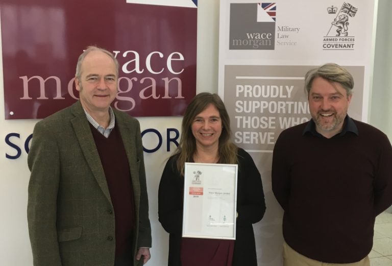 Wace Morgan staff pictured with the award, from left, Clare Dalby, solicitor, Jeremy Taylor, senior partner and Keir Hirst , Wace Morgan director.and secretary for Forces Law