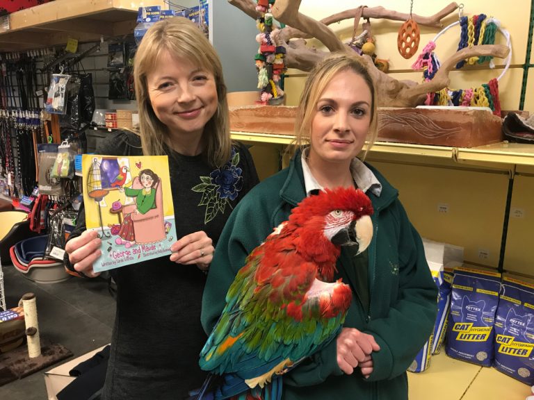 Author Sarah Griffiths meets Poncho, being held by Emma Small at Beck's Pets and Exotics in Shrewsbury