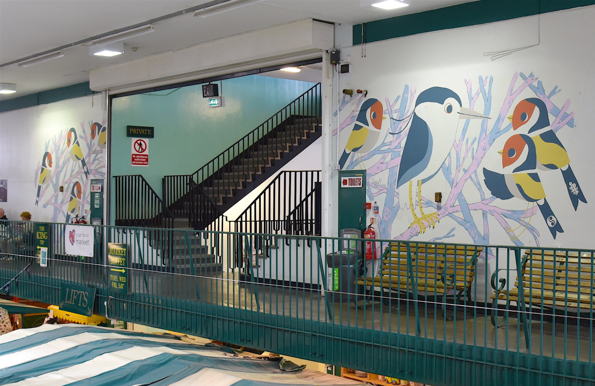 The giant mural inside Shrewsbury Market Hall painted by international artist Matt Sewell