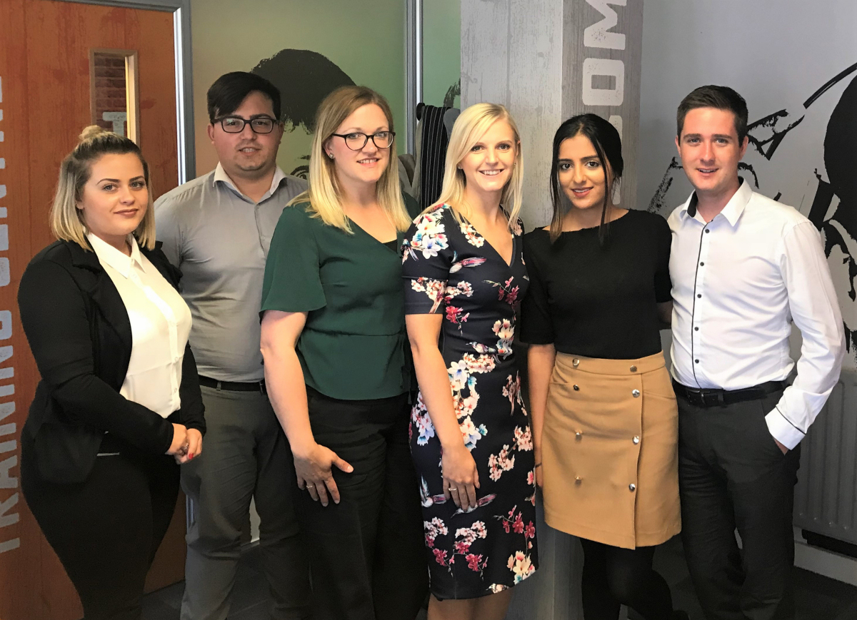 Encore Graduate, Lucy Warden benefits from the support of her team. Left to Right. Olivia Johnson, Bartlomiej Osiewala, Lydia Geddes, Lucy Warden, Serena Sanghera, Stephen Gibson