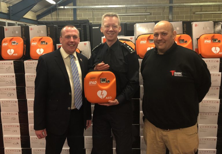 Paul Watts, Head of International Business Development at SP Services, which supplied 110 defibrillators to Border Force with resuscitation expert Stephen Furnell and Border Force Senior Officer Neil Dangerfield