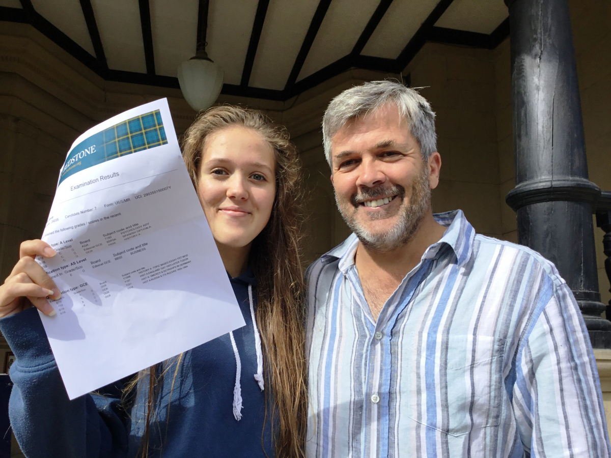 Emily Forman a student at Bedstone College celebrates her results with her dad, Dr David Foreman