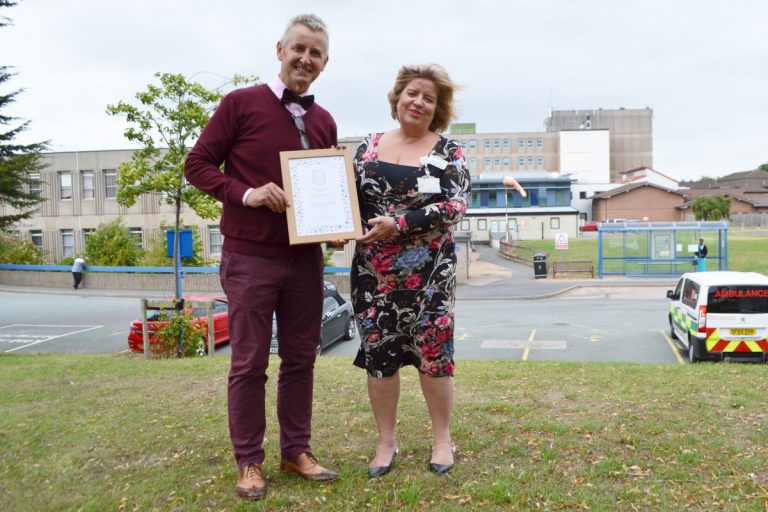 Clive Knowles, Chairman of the British Ironwork Centre and Julia Clark, the corporate management director of the Shrewsbury and Telford Hospital Charity