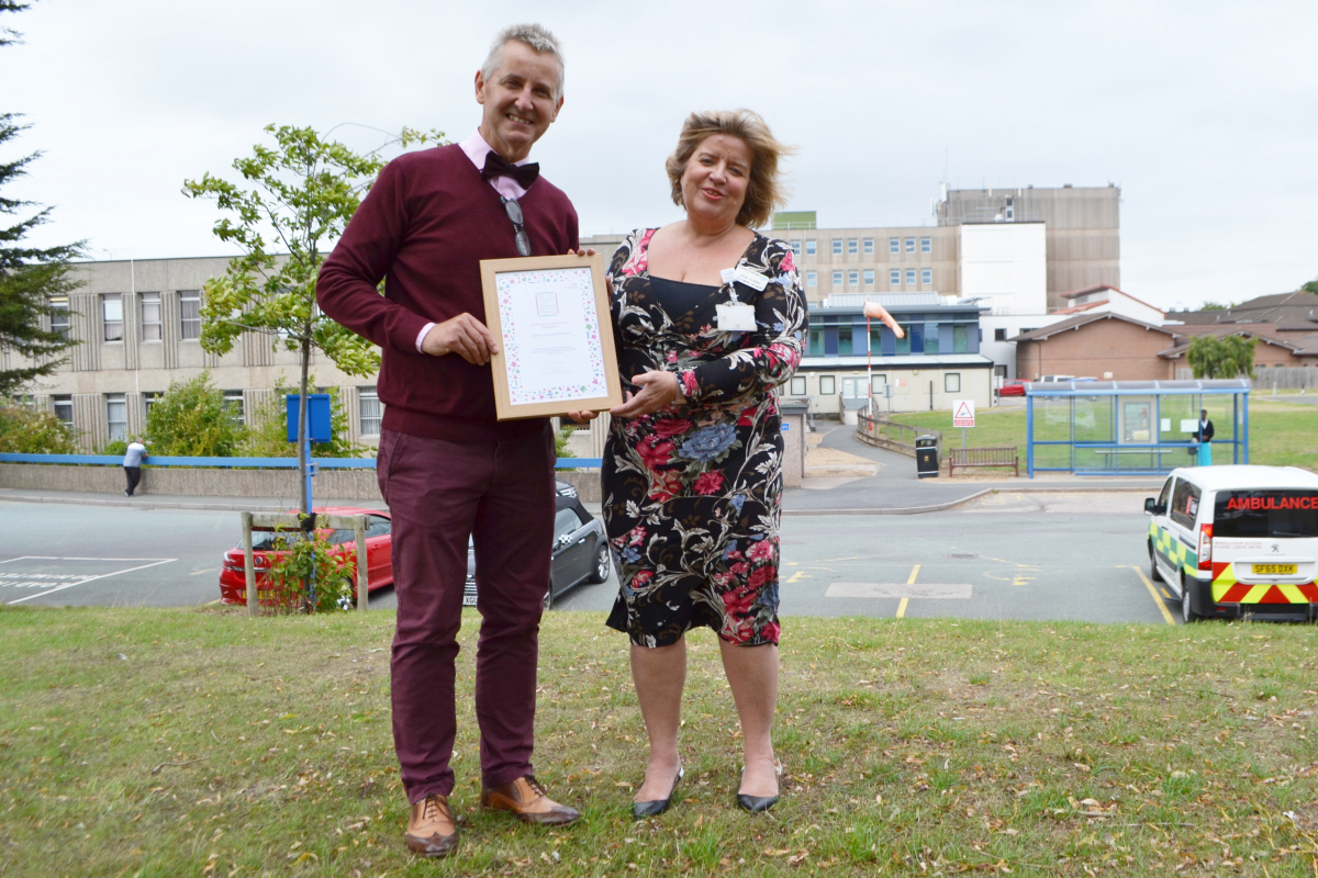 Clive Knowles, Chairman of the British Ironwork Centre and Julia Clark, the corporate management director of the Shrewsbury and Telford Hospital Charity