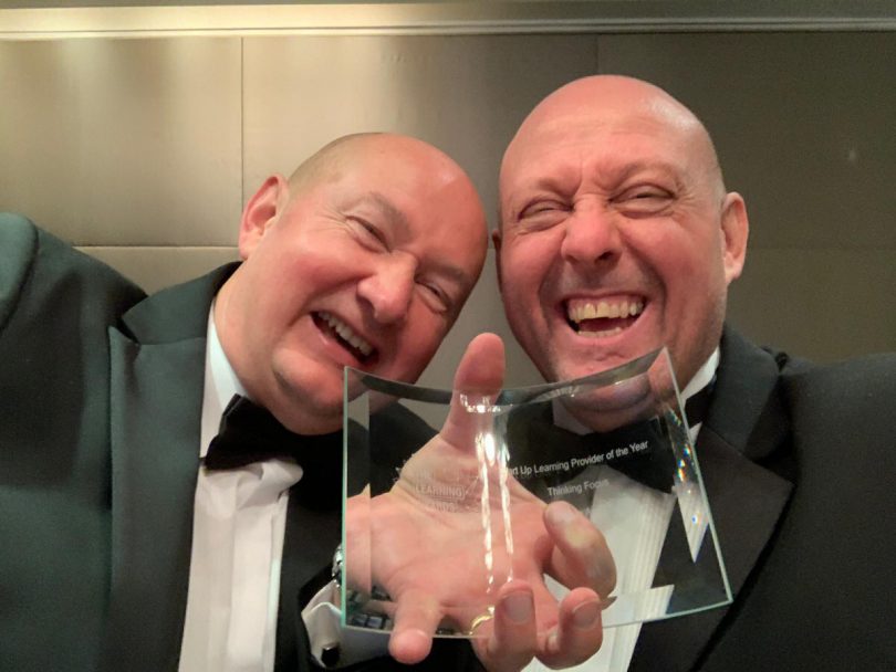 Rob Smith, and co-director Ricky Muddimer with the award