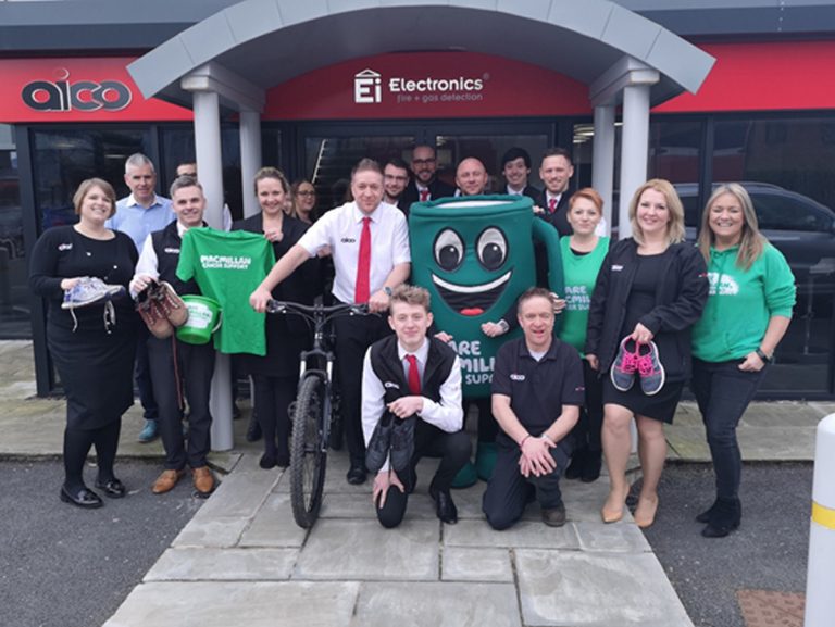 Kelly Hodgetts, Alex Garmston, Jordan Holmes, Allan Biggs, Lee Duffy, Kieran Smith, Indre Meskauskaite, Sarah Goddard, Deryn Ellis-Thomas, Michael Wright and Oswestry 10K and Midnight Ride Organiser Alan Lewis. Front Left to Right: Jo White, Ian Watman, Jane Pritchard, Dave Jennings, Lewis Bainbridge, Ady Jennings, Laura Opechowska and Kate Thomas from Macmillan Cancer Support