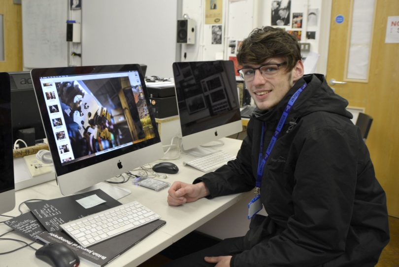 Winner, Oscar Haywood Martin, working on his photos
