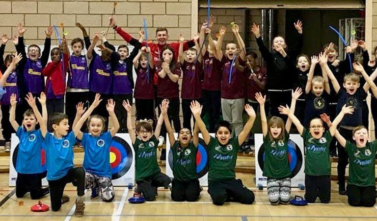 Youngsters from Shropshire primary schools face the camera after taking part in the latest Crossbar Primary Festival