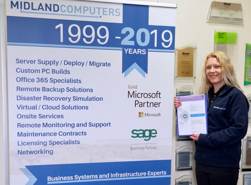 Jessica Kelly of Midland Computers holding the Certificate
